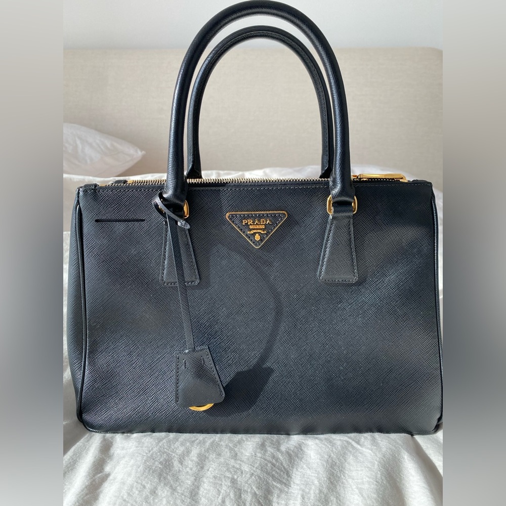 Authentic small Prada double zip Saffiano bag.